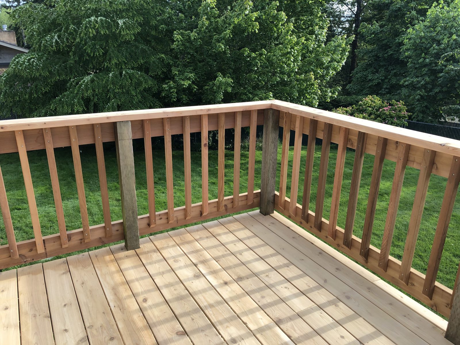 New cedar deck with wood railing