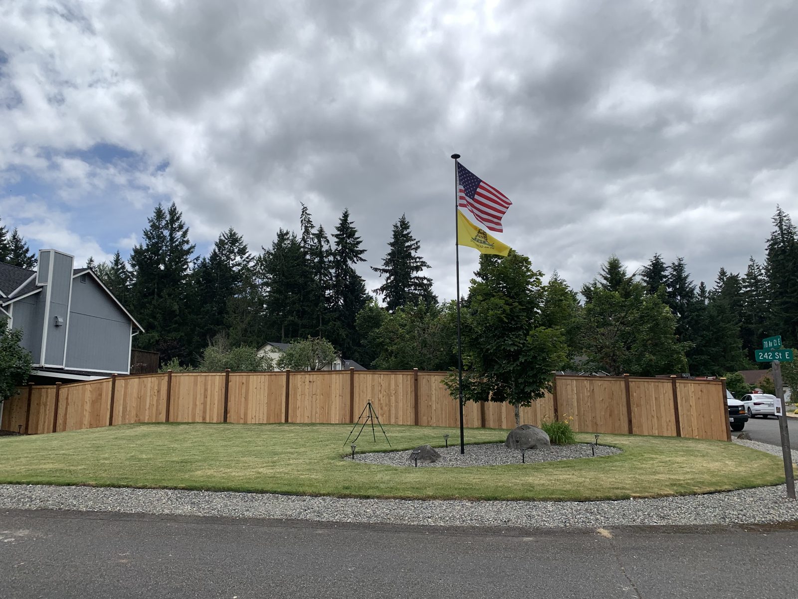 Cedar fence wrapping a corner lot